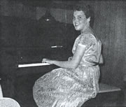 A picture of Wesla at a Piano